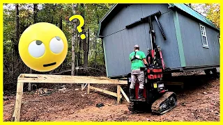 Shed Delivered on A Muddy Hillside..