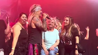Grandma Betty on stage with Steel Panther during COMMUNITY PROPERTY in Tucson Arizona 8/18/23