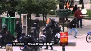 Greek riot police and protestors clash in Athens