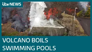 La Palma volcano: Swimming pools bubble up as lava spreads through streets | ITV News