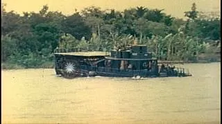 Men of US Mobile Riverine Force disembark from an ATC  and go ashore into a jungl...HD Stock Footage