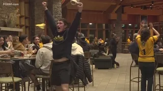 Quinnipiac students cheer on hockey team in national championship