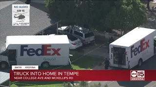 Truck into home in Tempe
