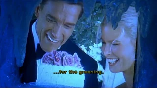 Batman and Robin - Freeze (Arnold Schwarzenegger) wife in wedding videos while Wagner plays