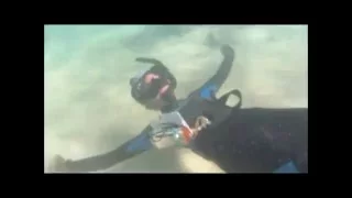 mermaid making sand angels