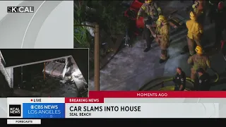 Firefighters rescue driver that crashed into Seal Beach home
