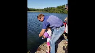 Little Girl Reels in Monster Fish with Mini Pole || ViralHog
