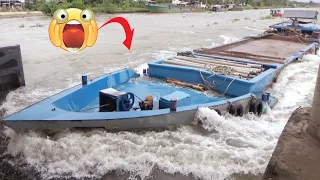 [694] Strong flowing water pushes the barge against concrete, which is very dangerous