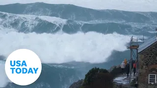 Stunning sight as colossal waves crash into coast in southern England | USA TODAY