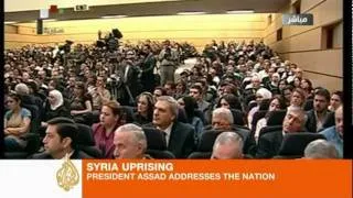 Assad gives mixed signals in speech