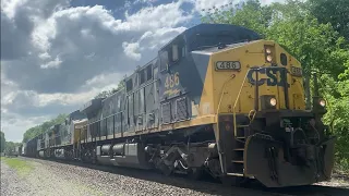 CSX M426 with YN2 #486 leading, a Safety Tanker and, lots of logs