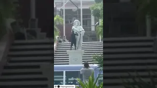 A black man was arrested  for damaging the Christopher Columbus statue at Government House