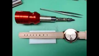 How to punch a new hole in leather watch band
