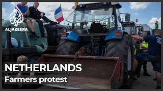 Dutch farmers block food warehouses over new environmental rules