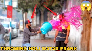 Throwing Holi Water Colour at People Prank ! || MOUZ PRANK