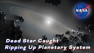 Dead Star Caught Ripping Up Planetary System