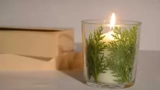 Decoración de velas con hojas