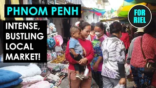 Immerse yourself in this vibrant Cambodian market in Phnom Penh! No expats or tourists! #forriel