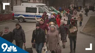 Ukrainian refugees flee across border to Poland