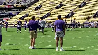 LSU QB Jayden Daniels works with the first team offense in Saturday’s practice in Tiger Stadium