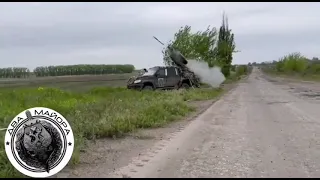 RU UB-32 rocket pod mounted on a truck firing