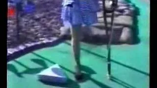Carol golfing