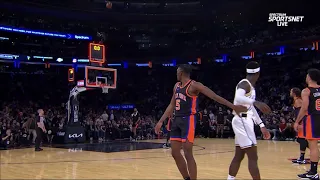 Dennis Schroeder makes a half court shot without looking!