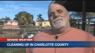 Roof smashes into truck among Port Charlotte storm damage