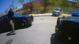 Body camera video shows chaotic shootout following police chase