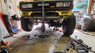 Halfway to the weight sitting on the Leaf Springs. Solid Axle Swap 1985 Nissan 720 Build Day 3.