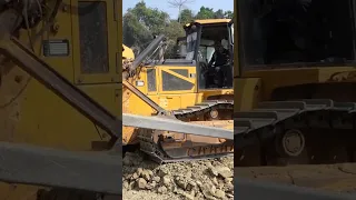 Technique Skill Shantui DH17 Dozer moving around to break the stone and pushing Rock filling up