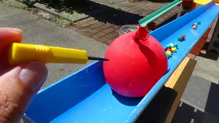 Marble Run ☆ Water balloon with marbles. Handmade rain gutter course