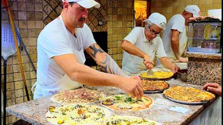 Masters of traditional Roman Pizza in this historic Pizzeria in the Testaccio district of Rome