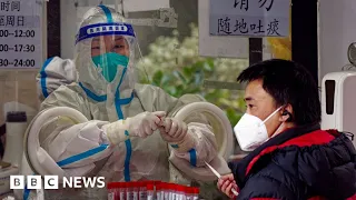 China’s health service under pressure as Covid infections surge - BBC News