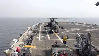 Apaches taking off of the USS New York