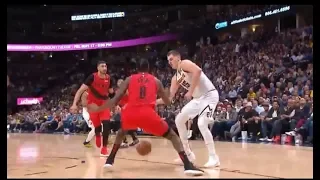 NIkola Jokic passes ball between Al-Farouq Aminu's legs 2019 NBA Playoffs Game 2