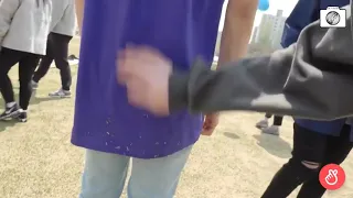 chan removing grass from felix's butt and slapping it at the end
