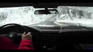 fast and smoothly drifting with a bmw e34 on snowcovered country roads