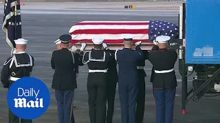 George H.W. Bush's body returns to Texas for his burial