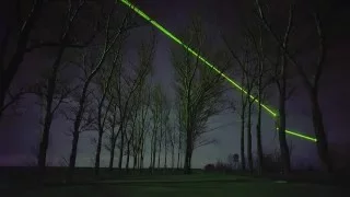 Daan Roosegaarde uses green lasers to showcase the "beauty" of wind turbines
