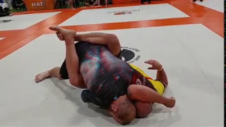Purple Belt Puts His Opponent To Sleep With A Choke From Inside Closed Guard