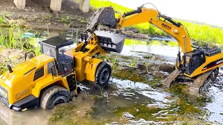 RC Trucks at work in teh mud 4x4 Power Wheel Adventure