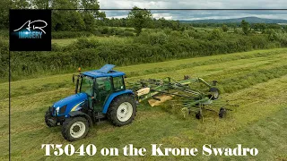 New Holland T5040 Raking with the Krone Swadro 880