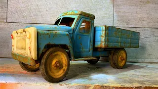 Restoration of a toy truck. It was made at the tractor factory!