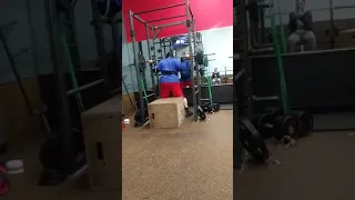 Box squatting 350 pounds with resisting bands