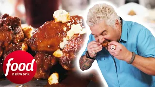 Guy Tries SAUCY Smoked Chicken Wings That Fall Off The Bone | Diners Drive-Ins & Dives