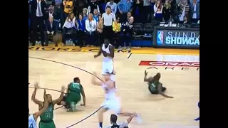 Warriors' Draymond Green tackles Celtics' Marcus Smart & Evan Turner to get himself open.