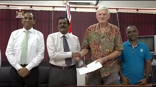 Fijian Minister for Local Govt & Housing officiates at the signing of housing projects