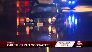 Car gets stuck in flood waters in Quincy