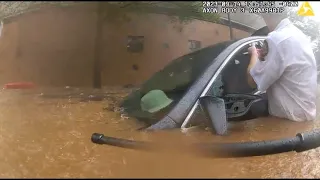 Bodycam video | Man rescued from car caught in flooded Atlanta street